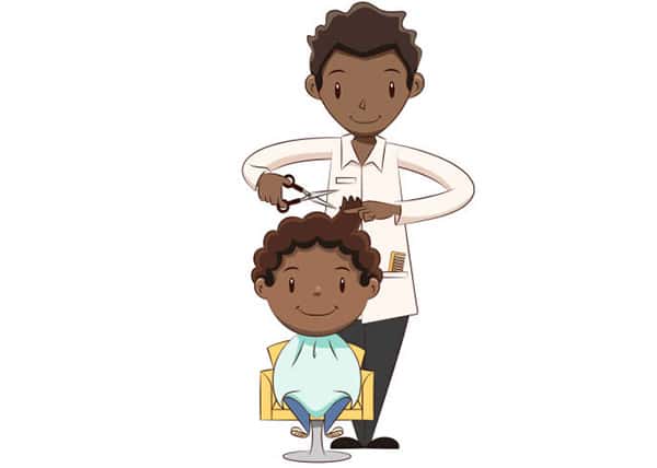 Four-year-old boy getting the haircut